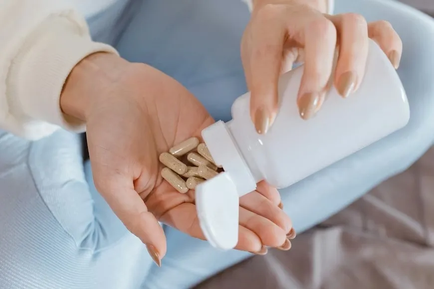 Postpartum vitamins and supplements that support healthy hair regrowth after pregnancy.
