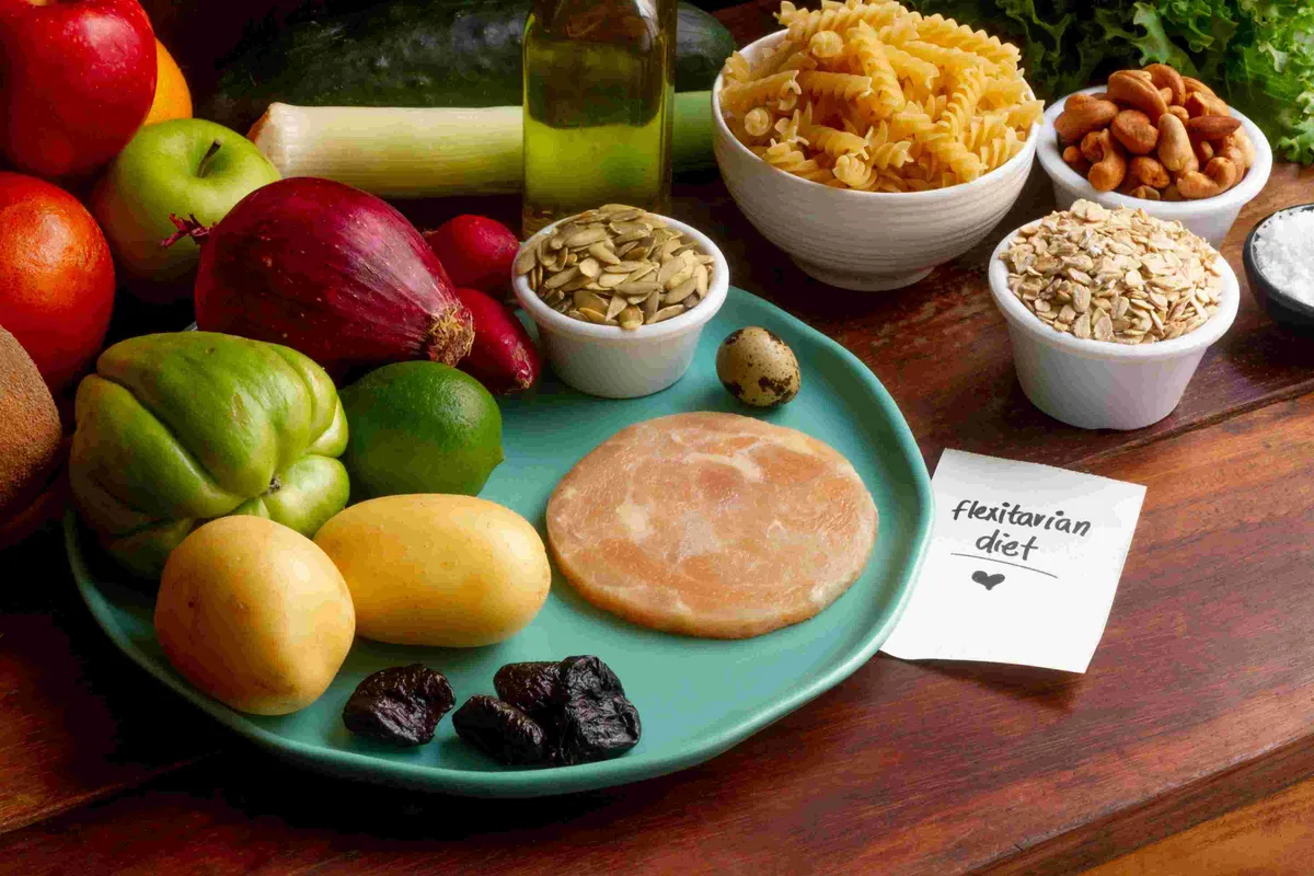 Healthy vegetarian meal bowls with fresh vegetables, avocado, beans, chickpeas, sprouts, and colorful salad ingredients arranged on a dark table with nuts, seeds, and lemons
